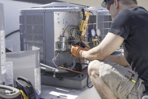 HVAC repair in Manasquan being done by technician